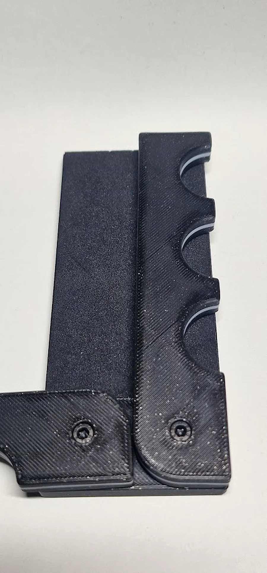 RailGrip aus der Seitenansicht mit Detail auf die Aussparungen